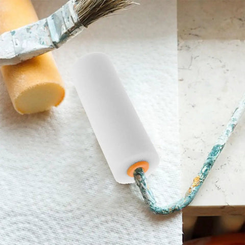 Close-up of a 6 Piece Paint Roller Set Boasting Hella Soft Sponge Covers And Comfort Grip Handles for wall painting.