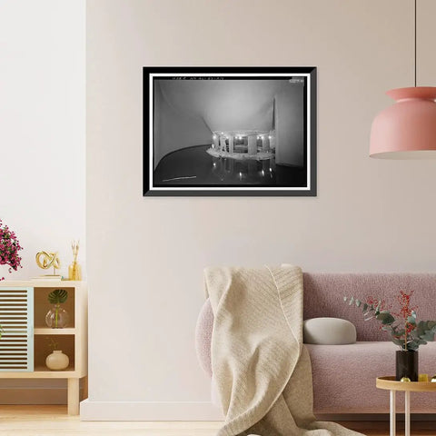 Vintage Framed Print Of Wilson Dam And Hydroelectric Plant Turbine And Generator Spanning The Tennessee River At Wilson Dam Road In Muscle Shoals AL Wall Art For History Buffs Reproduction From Library Of Congress Archive displayed on living room wall.