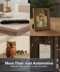 Living room and decor items featuring owl statue, photo frame, remote on table, ideal for light-duty mounting use.