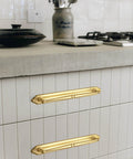 Champagne Bronze Cabinet Pulls 5.04 Inch Center To Center With Back Plate Zinc Alloy 2 Pack installed on white kitchen drawers