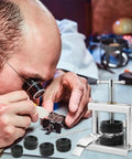 Watch Press Tool Set With 18 Molds Case Closer Crystal Press And Battery Replacement Repair Kit in use by a watch repair professional