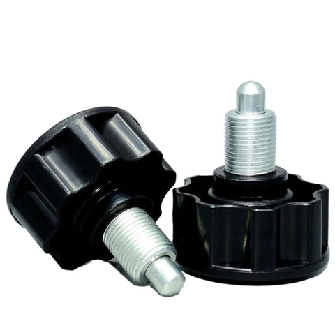 Pro Grade Mini Indexing Locking Plungers Deliver Real Deal Spring Loaded Positioning Power For Home Gym Builds And Machine Fabrication Precise M16 M18 Threads, black plastic and galvanized steel, two units shown.