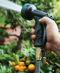 Expandable Hose Repair Kit With Brass GHT Fittings And Ball Valve 0.353 Inch Barb in use with garden spray nozzle