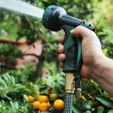 Expandable Hose Repair Kit with 0.353-Inch Hose Barb GHT Adapters two brass shutoff valves in use in a garden setting