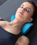 Woman using Neck And Shoulder Relaxer Cervical Traction Device For TMJ Pain Relief And Cervical Spine Alignment, Blue