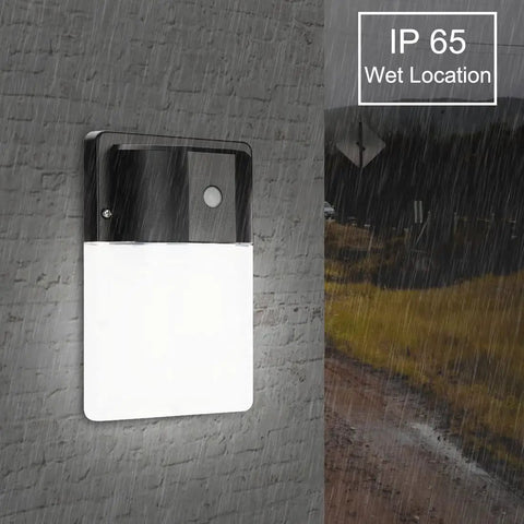 LED Mini Wall Pack With Dusk To Dawn Photocell, 13W 5000K 1430 lm Outdoor Security Light, IP65 Waterproof shown during rain