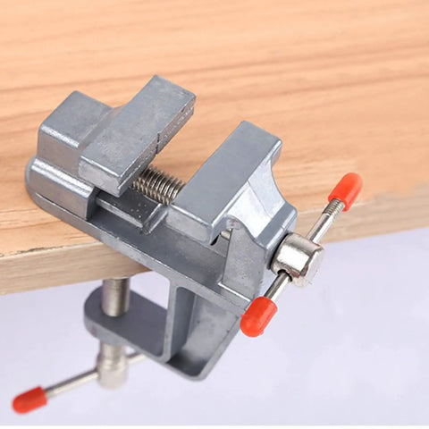 Premium Clamp On Vise With A Quick 35mm Jaw Opening For Workbenches, mounted on wood for secure metal and wood projects.
