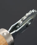 Close-up of Spur Wire Embedder Tool for Beehives, showing metal wire wheel for easy frame wiring and smooth comb installation.