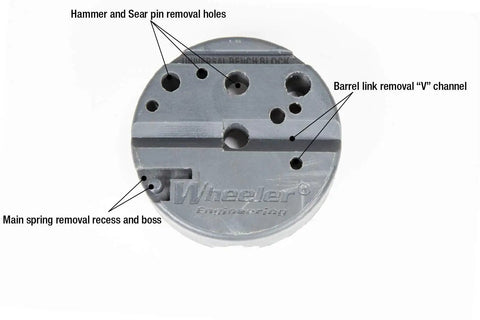 Universal Bench Block With Non Marring Urethane Construction For Pistols And Gunsmithing, showing labeled holes and channels