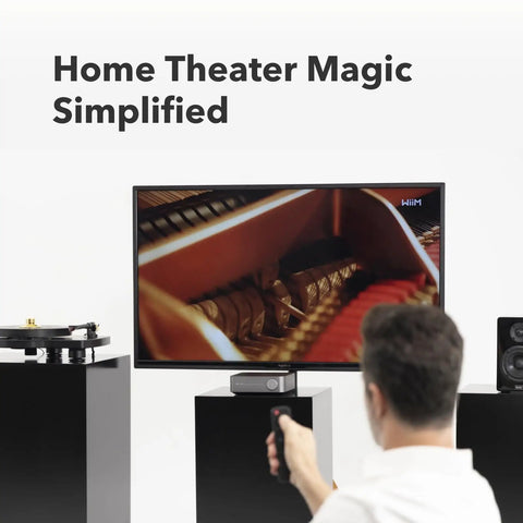 Smart Multiroom Streaming Amplifier With AirPlay Google Cast And Alexa Voice Control HDMI Output Streams Spotify Amazon Music Tidal And More Powers Passive Speakers Up To 60W Per Channel At 8 Ohms Space Gray shown in home theater setup