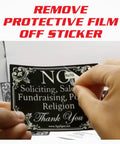 Person peeling protective layer off Two Pack No Soliciting Door Sign 4x3 Vinyl Weatherproof Peel And Stick For Home Or Business Stop Door Knocks From Sales Reps Fundraisers Political Canvassers And Religious Solicitors.