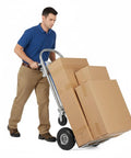 3 In 1 Beefy Heavy Duty Folding Dolly Cart With 550 Lbs Capacity Industrial Aluminum Frame Convertible Utility Cart For Moving Appliances, Furniture, Equipment, And Luggage. Person moving stacked boxes on stair-climb dolly