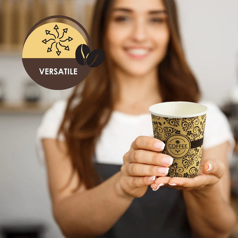 Woman holding 8 Ounce Disposable Paper Coffee Cup For Hot Beverages To Go Leak Resistant And Sturdy, ideal for cafes and home.
