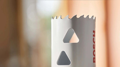 Bosch 2-1/4 in bi-metal T-slot hole saw, silver metal body with red Bosch logo, side view