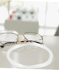 Glasses Repair Thread Kit For Half Frame Eyewear Lanyard And Wire Repair Tool on table with stainless steel thread beside specs