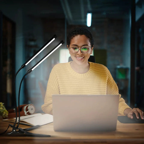 Dual Head LED Desk Lamp With Clamp, Eye Care Three Color Modes, Five Level Dimming, Clip On Light used by woman at desk