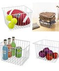 Vibe Shift Your Deep Freeze Setup With Heavy Duty Wire Baskets Acting As Kitchen Storage Organizer Bins For Chest Or Upright Models Refrigerator Dividers With Beefy Handles Four Pack Pearl White filled with sports gear and food.