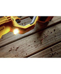 Professional High Performance 20V Max Cordless Brushless Stud And Joist Drill With Quick Change 7 16 Inch Chuck illuminating wooden surface.
