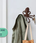 Rad Cast Iron Octopus Wall Hook Rustic Brown Antique Finish with keys and coat, perfect for smart storage and nautical decor.
