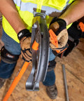 Worker using Iron Conduit Bender Full Assembly For Three Quarter Inch EMT And One Half Inch Rigid With Wide Foot Pedal Angle Setter