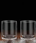 Double Wall Whiskey Rocks Glasses for Your Whiskey and Scotch Favorites 5.5 Oz clear insulated tumblers on wooden surface.