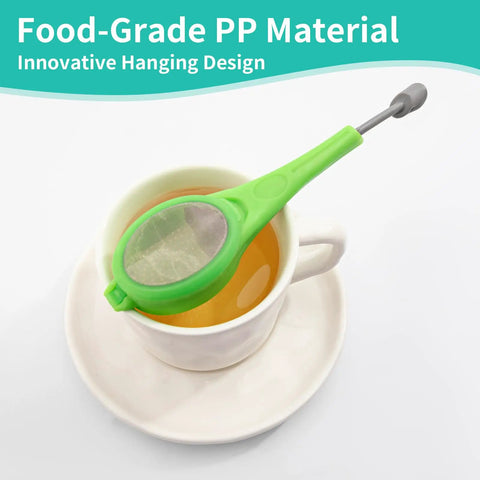 Long Handled Tea Infuser With Fine Mesh Strainer And Built In Plunger Reusable Loose Leaf Coffee Filter dual compartment steeper in green resting on a mug