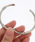 Close-up of 12 Piece Zinc Alloy Shower Curtain Hooks With Smooth Glide Double Sided Rings For Bathroom Rods No Tools Needed Easy Install Durable Rust Resistant With Shiny Silver Finish.