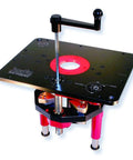 Premium Router Lift With Dead Smooth Height Adjustment And Tough As Nails Top Plate Includes Full Ten Piece Insert Ring Set Plus Quick Access Storage Tray For Woodworking Pros showing height adjustment dial and sturdy base.