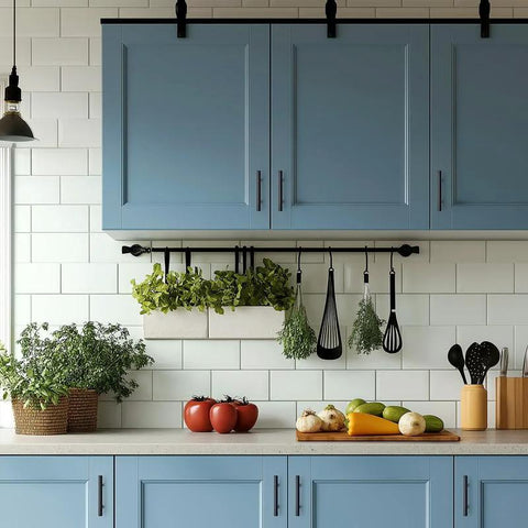 Stainless Steel Cabinet Handles With Three Inch Hole Spacing Drawer Pulls for cabinets in kitchen setting, matte black finish, on blue cabinets.