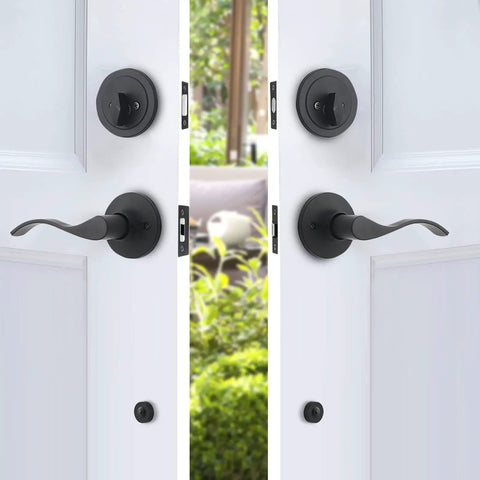 Double Door Handle Set With Dummy And Keyed Entry In Matte Black, Exterior Door Hardware With Wave Lever, shown on white doors