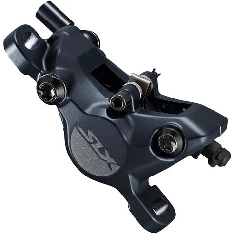 Close-up of M7100 SLX Hydraulic Disc Brake Left Front Post Mount 2 Piston Caliper Lightweight Enduro Ready Smooth Lever Reach Adjust