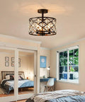 Farmhouse Semi Flush Mount Ceiling Light With Crystal Teardrops, Matte Black Finish, E12 Base, 3 Lights, in bedroom setting