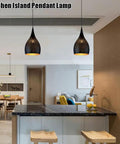 Industrial Wrought Iron Pendant Light Adjustable Single Head E27 Chandelier for Kitchen Island, dark finish, modern kitchen setting.