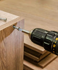 214 Piece Screwdriver Bit Set In S2 Steel With Quick Release Extension used for assembly on wooden panel
