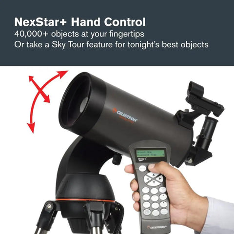 Person holding hand controller with NexStar 127SLT Computerized Telescope With SkyAlign Auto Finder on tripod base.