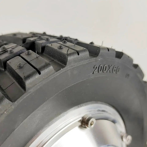 Close-up of Dual Drive 8 Inch Hub Gear Motor Wheel tread, suitable for DIY portable platform carts and hand trucks.