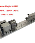 Beefed Up 4 Axis Cnc Rotary A Axis Indexing Head Featuring Rock Solid Nema23 Motor Precision And Snappy Swappable 80 100 Mm 3 4 Jaw Chucks For Dope Engraving Workflows With Mounting Base, showing 65mm center height and components.