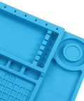 Close-up of blue Pro Grade Silicone Electronic Repair Mat With High Temperature Resistance Antistatic Soldering Pad with slots