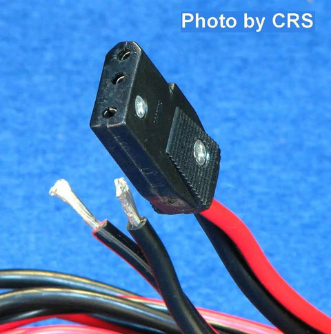 Close-up of Heavy Duty 12 Gauge 3 Pin Power Cord For CB And Ham Radios 6 Foot Black Cable With Positive And Negative Fused Leads