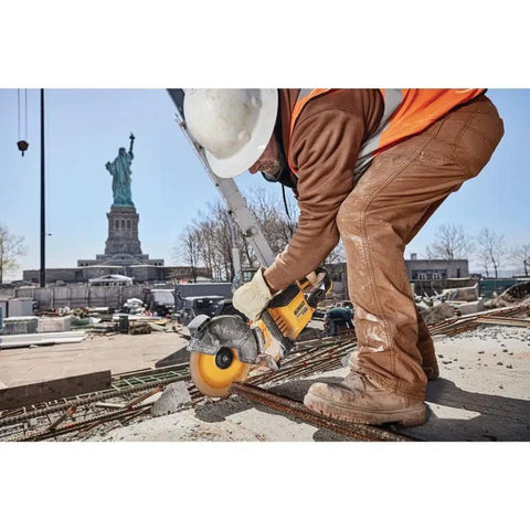 Worker using 9 Inch 5/64 By 7/8 T1 Flexvolt Cutoff Wheel For Metal Cutting Tough As Nails Performance Smooth Finishes And Quick Slices Durable Grinding Wheel Built For Cordless Grinders And Power Tools on rebar