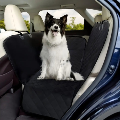 Smooth Operator Dog Car Seat Cover And Hammock Back Bench Protector With Water Resistant Quilted Oxford Fabric Plus Wide Side Flaps for a dog in a car.