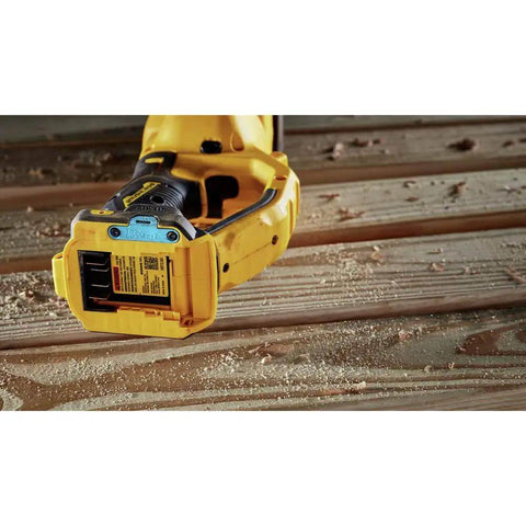 Close-up of Professional High Performance 20V Max Cordless Brushless Stud And Joist Drill With Quick Change 7 16 Inch Chuck on wood.