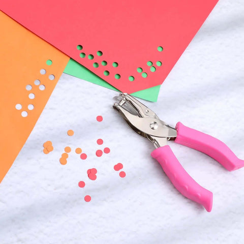Dual Size Circle Hole Punch With One Quarter Inch And One Eighth Inch Holes For Paper Crafts And Scrapbooking shown with paper cutouts