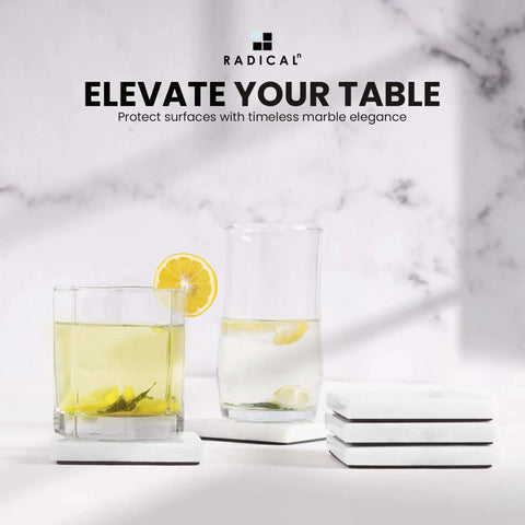 Solid White Square Marble Coasters Set Of Six, Polished Drink Pads For Dining Tables And Coffee Bars with drinks on display.