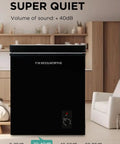Hella Spacious 7.0 Cu.Ft Chest Freezer In Bold Black with adjustable thermostat and quiet operation settings in a modern room.