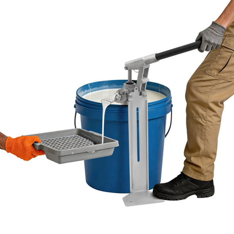 Heavy Duty Manual Loading Paste Pump With 15 Inch Handle and Stable Aluminum L Base for Thick Liquids in action pouring into tray.