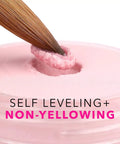 Kolinsky Size 10 brush dipping into pink powder for 16 Fl Oz Liquid Monomer For Nail Extensions With 100 Percent Kolinsky Size 10 Brush Starter Duo