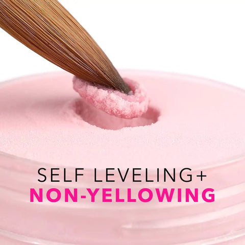 Kolinsky Size 10 brush dipping into pink powder for 16 Fl Oz Liquid Monomer For Nail Extensions With 100 Percent Kolinsky Size 10 Brush Starter Duo