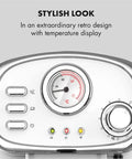 No Drama Stainless Steel Electric Coffee And Milk Frother Machine With Clear Removable Water Tank And Simple Dial Controls showing retro design and temperature display.