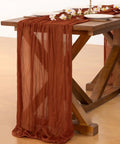 Rustic Terracotta Table Runner Hand Dyed From Breathable Cheesecloth on wooden table, 35"W x 120"L, ideal for elegant dining setups.